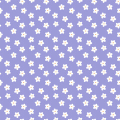 A seamless pattern of white flowers isolated on blue background. Vector illustration.