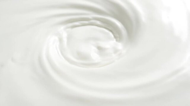 Creamy White Liquid Swirling in Slow Motion Macro Abstract Background