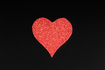 Obraz premium Red Glitter Heart on Dark Background