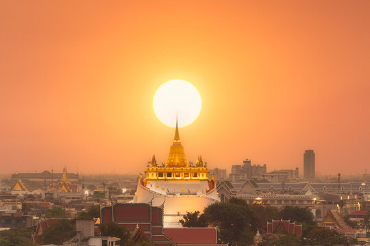 Sunset at the middle of the temple The Golden Mount. Travel Land