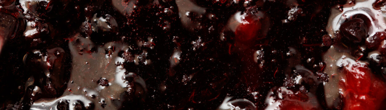 Raspberry jam as an abstract background. Close-up
