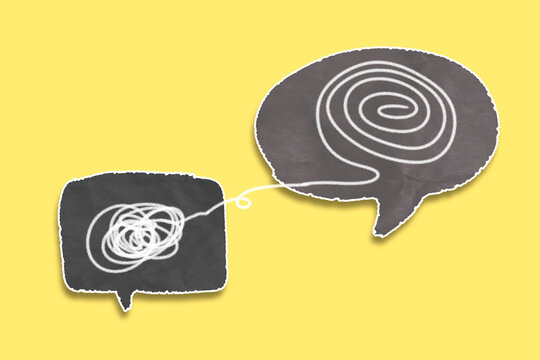 Mental health, brain disorder, World mental health day, Alzheimer, Psychology concept. Tangle of thoughts and clear line on speech bubble paper cut with yellow background
