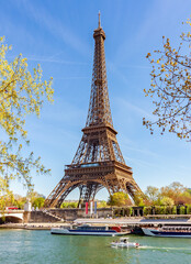 Eiffel Tower and Pont d'Iena bridge over Seine river in Paris, France
