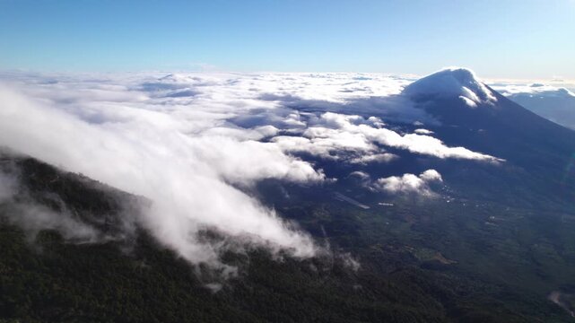 Clouds And Fog Over Acatenango Stratovolcano in Guatemala. - aerial shot