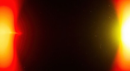 Red and yellow light effect with dust and bokeh on black background