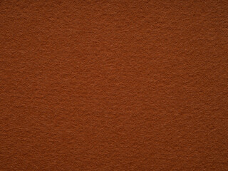 Fototapeta premium Soft brown felt fabric cloth texture for DIY projects. Closeup flannel fabric fiber cloth luxury for fashion embellishment and decoration. The flannel texture is detail and macro.