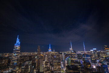 Night view of Midtown Manhattan with illuminated skyscrapers 