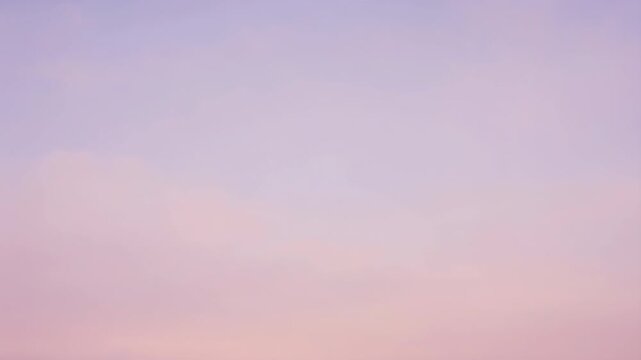 Soft colorful gradient in cloudscape during twilight with copy space.