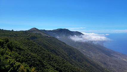Obraz premium West coastline view with mountains range and clouds, Island El Hierro, Canary Islands, Spain, Europe.