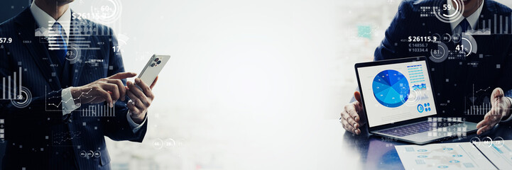 Business scene and statistical data concept. Wide angle visual for banners or advertisements.