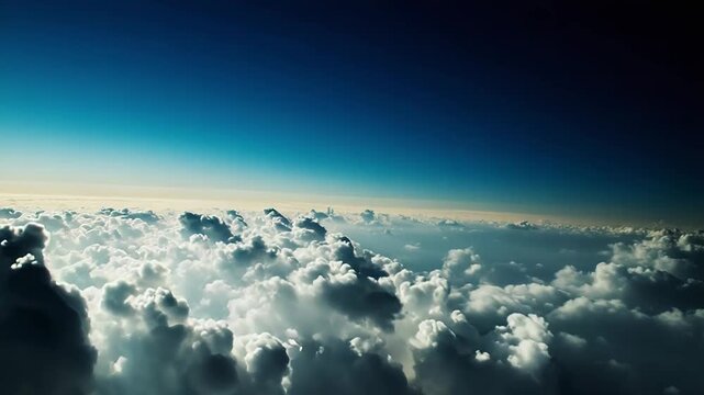 Expansive view above a horizon of soft white cloud formations under a serene gradient sky, symbolizing peace, freedom, travel, clear thoughts, and aspiration