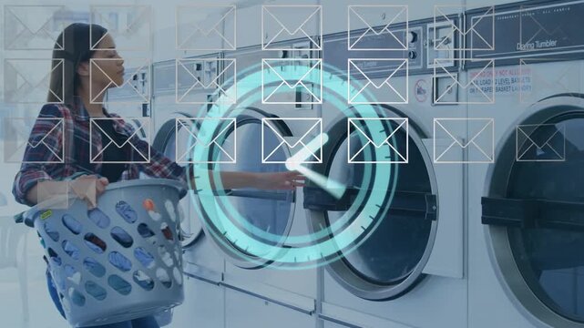 Video of message and clock icons with young woman putting clothes in washing machine