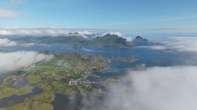 A View of Fjords, Islands, and Clustered Houses Shows Ballstad From Nonstinden, Lofoten, Norway - Aerial Drone Shot