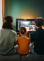 family watching  TV at home