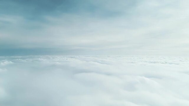 White fluffy clouds forming an expansive atmospheric carpet, stretching to the horizon under a light blue sky, conveying notions of freedom, peace, and heavenly serenity