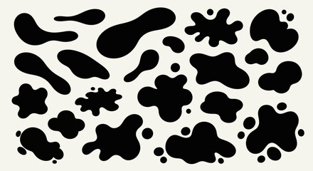 Abstract black stains pattern with organic shapes against an off-white background