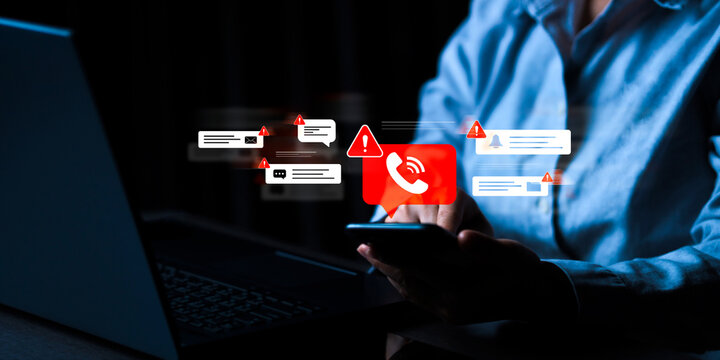 The smartphone screen displays a warning about fraudulent calls, showing cyber threats from fraudulent callers and phishing threats. This is a technological security measure to prevent online attacks.