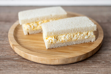 Tamago Sando sandwich on wooden table