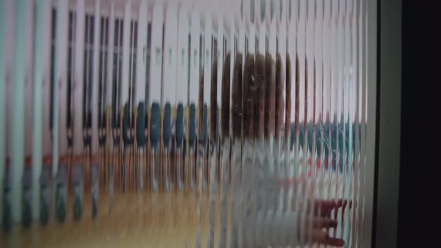 Small child screaming behind distorted glass panel with multiplied face suggesting early trauma deep emotional rupture fear depression and intense psychological fragmentation