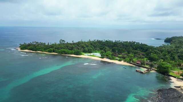 Beautiful aerial view from Ilheu das Rolas at South of S&atilde;o Tom&eacute;,Africa.
Aerial side backwards drone shot a sunny day.