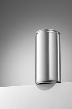 Blank aluminum 200ml slim beverage can standing on white surface.