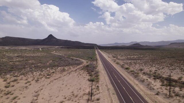 An empty highway in the Big Bend region of west Texas, desert landscape aerial