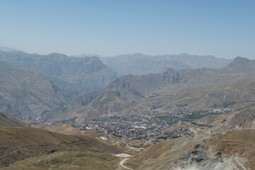 A view of Hakkari province from above. Hakkari in spring. A view of Y&uuml;ksekova, Hakkari city from the mountains. Y&uuml;ksekova, Hakkari, T&uuml;rkiye.
