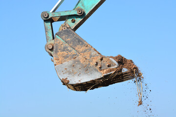 Excavator Working on Construction Site.