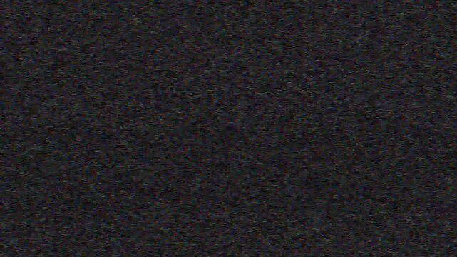 Old TV glitch. Real analog noise. VHS rewind. Electronic transition. Color flicker fuzzy grain artifacts texture on dark black abstract background.