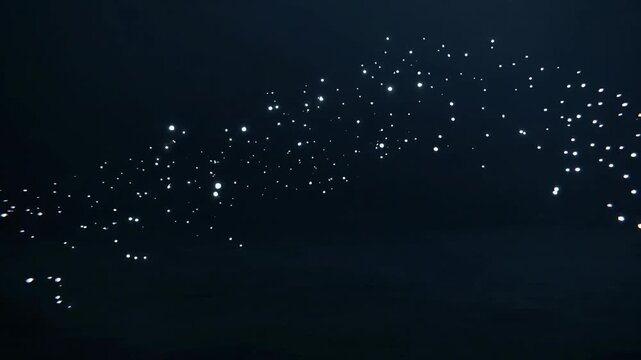 Countless brilliant starlit sparks gently drift across a profound, ink-black void, forming celestial patterns that ignite wonder in the quiet depths of twilight's embrace.