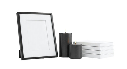 Black picture frame with lit candles and stack of books