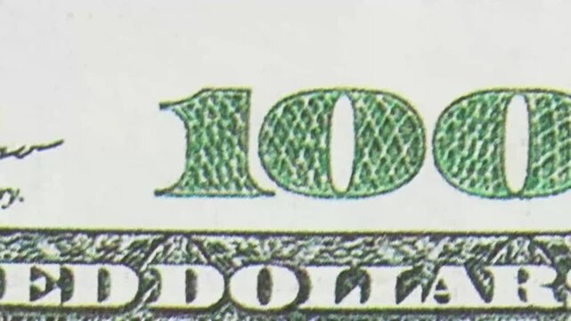 Close-up of a 100-dollar bill. Shooting a bill in motion. In a retro style. VHS effect.4K
