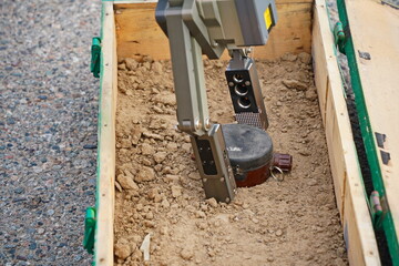 Naklejka premium A minesweeper robot for mine clearance. Military exercises.