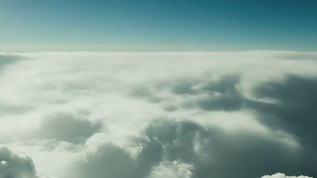 White fluffy clouds floating high in the sky creating a serene atmospheric vista, perfect for backgrounds, abstract concepts, and design elements reflecting freedom and lightness