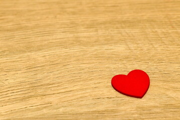 Fototapeta premium Single Red Heart on Wooden Backgroun