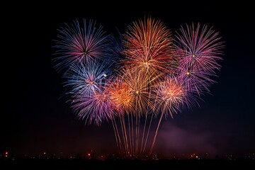 Vibrant fireworks illuminate the night sky in a spectacular celebration of light and joy