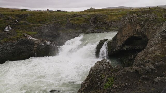 Downstream of Godafoss waterfall in northern Iceland near Akureyri, the powerful river pours over rocks
