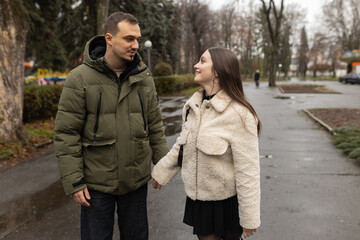 Young couple walking in the park