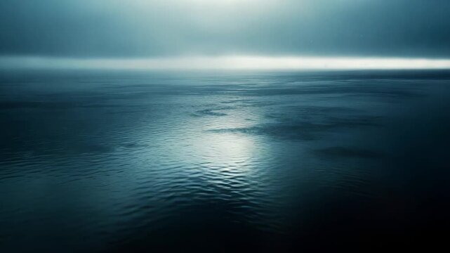 Water surface extending to the horizon under a cloudy sky, reflecting soft diffused light, creating a calm and serene atmosphere with a feeling of endlessness and peace