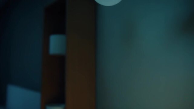 Modern electric aromatherapy diffuser emitting gentle light and soothing mist, contributing to relaxation and wellness in a contemporary home interior setting