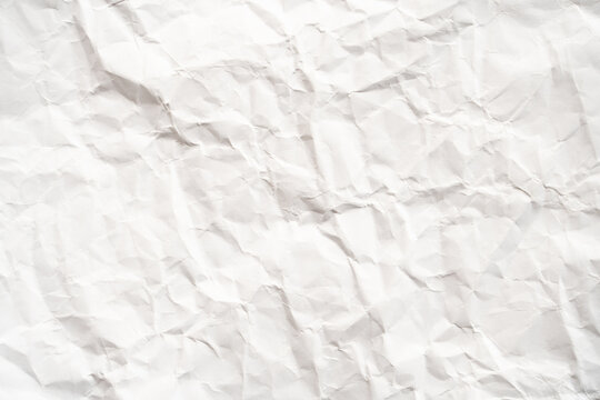 Grunge wrinkled white color paper textured background with copy space. Use for decoration or layer