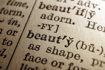 Wordbeauty printed on dictionary page, macro close up