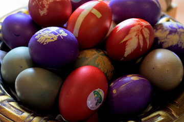 Colorful Easter eggs in a decorative bowl