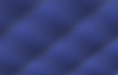 Fototapeta premium Dark blue fabric texture with diagonal folds and shadows