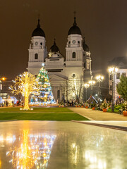 Metropolitan Cathedral and National Theatre Park illuminated at night during winter holidays, Iași, Romania