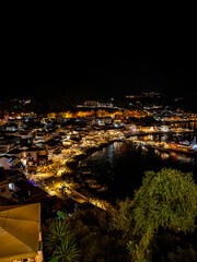 Night view of Parga town and harbour from the fortress, Greece