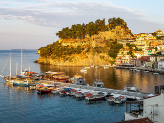 Harbour and boats at sunrise in Parga, Greece