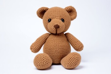 Fototapeta premium The teddy bear in embroidery style textile plush toy.