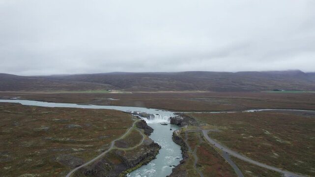 Aerial drone shot of Godafoss Waterfall in northern Iceland pulling back