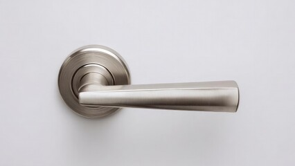 Brushed stainless steel door lever on a circular backplate. Concept Brushed stainless steel hardware, Door lever on circular backplate, Modern interior design, Minimalist fixtures